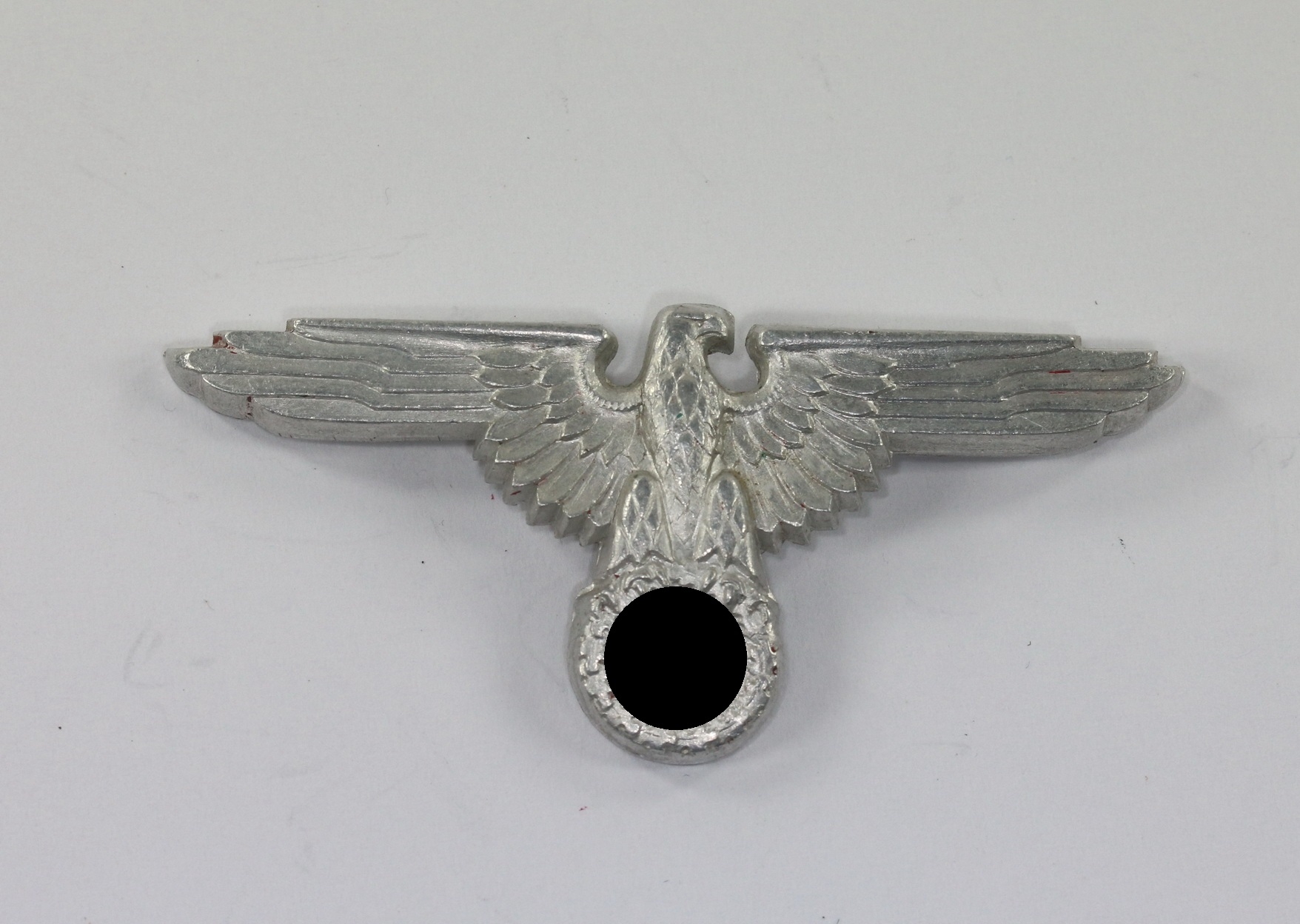 _waffenss_adler_f_r_die_schirmm_tze_hst_rzm_m152_aluminium_1__1 Waffen-SS, Adler für die Schirmmütze, Hst, RZM M1/52, Aluminium – Bild 1