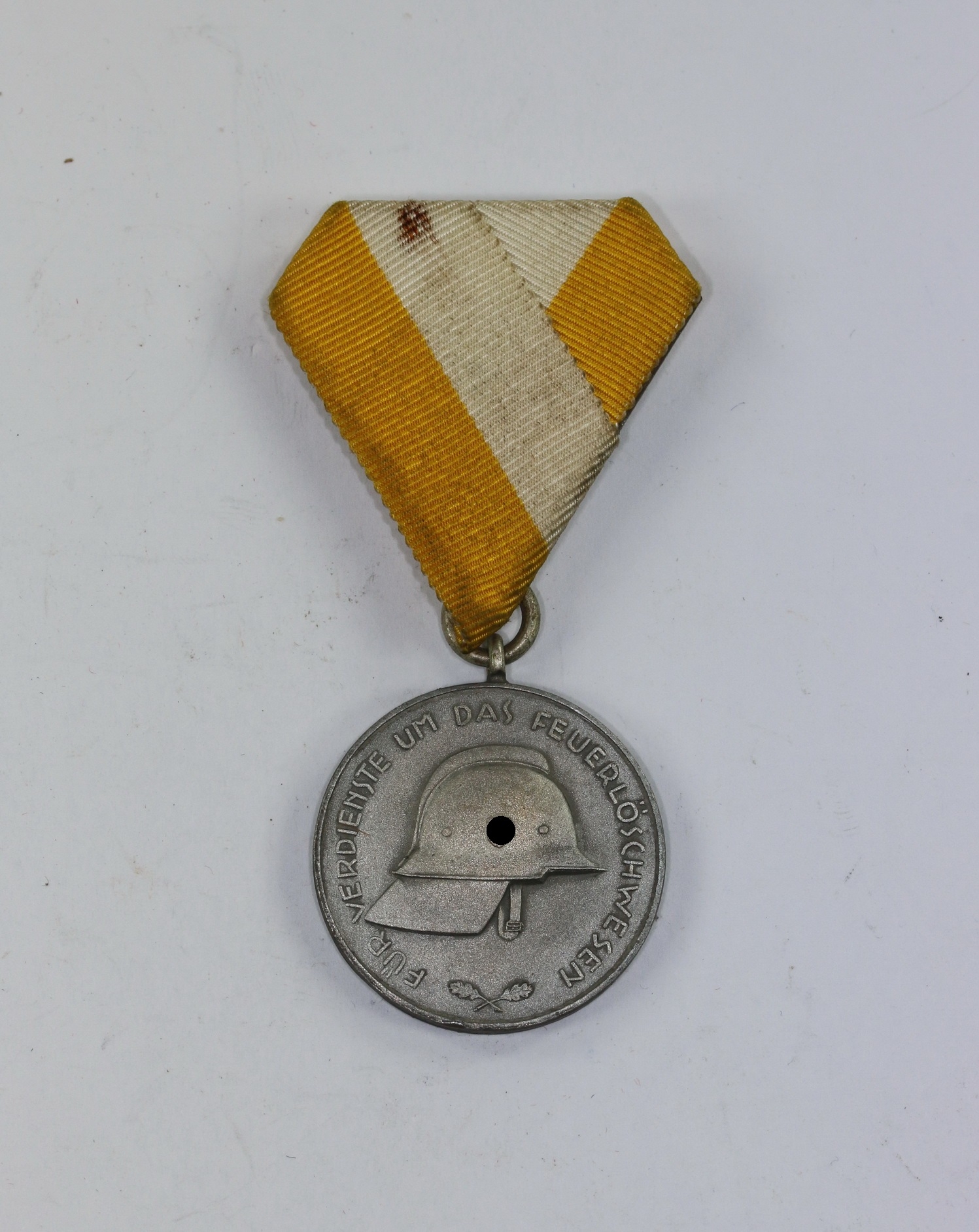 ehrenzeichen_f_r_mitglieder_der_feuerwehr_provinz_hannover_1934_mit_hakenkreuz_1__1 Badge of Honour for the Hannover Fire Service 1934 (With Swastika). – Bild 1