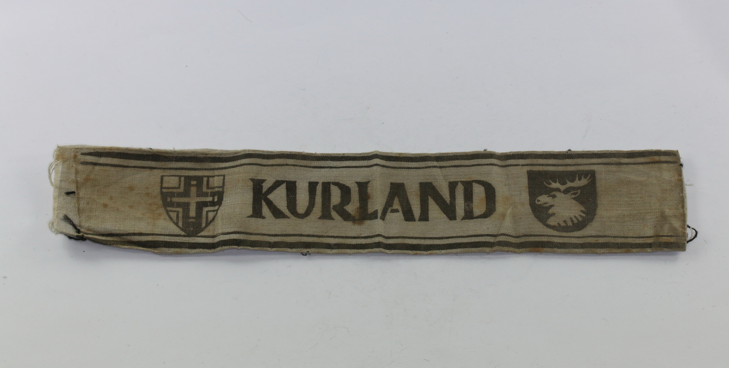 img_9291_bildgr_e_ndern_3 Cuffband "Kurland" on gas cape material. – Bild 1