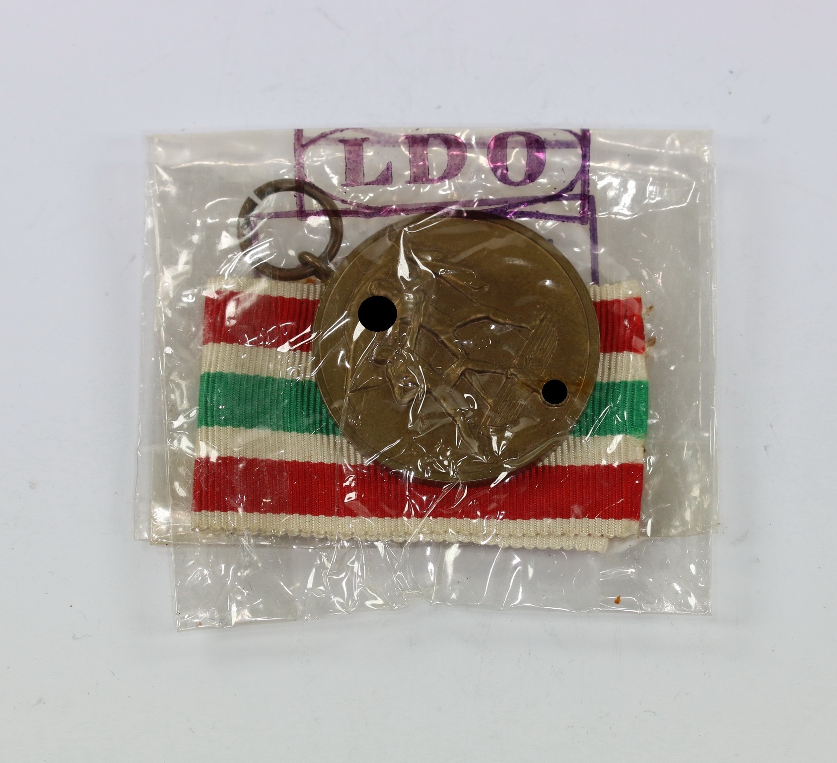 memellandmedaille_hauptm_nzamt_berlin_in_ldo_cellophant_te_1__1 Memellandmedaille, in LDO Cellophantüte – Bild 1