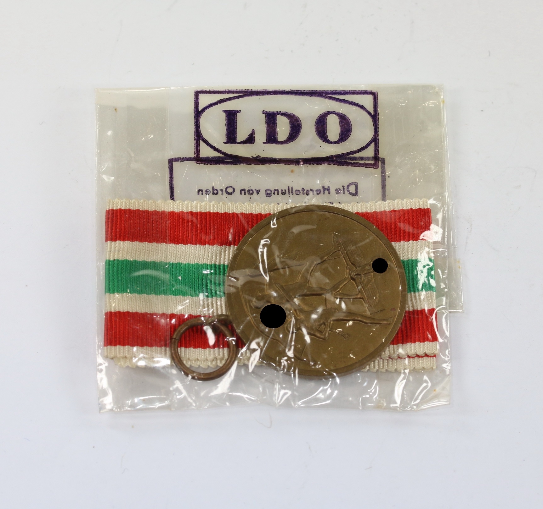 memellandmedaille_medaille_zur_erinnerung_an_die_heimkehr_des_memelalndes_in_ldo_cellophant_te_1__1 Memellandmedaille, in LDO Cellophantüte – Bild 1