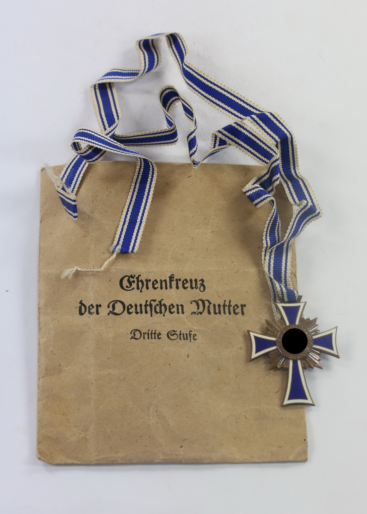 mutterkreuz_in_bronze_in_verleihungst_te_lind_meyrer_obersteinnahe_1__1_4nd Bronze Mother Cross in Envelope, Lind & Meyrer Oberstein/Nahe – Bild 1