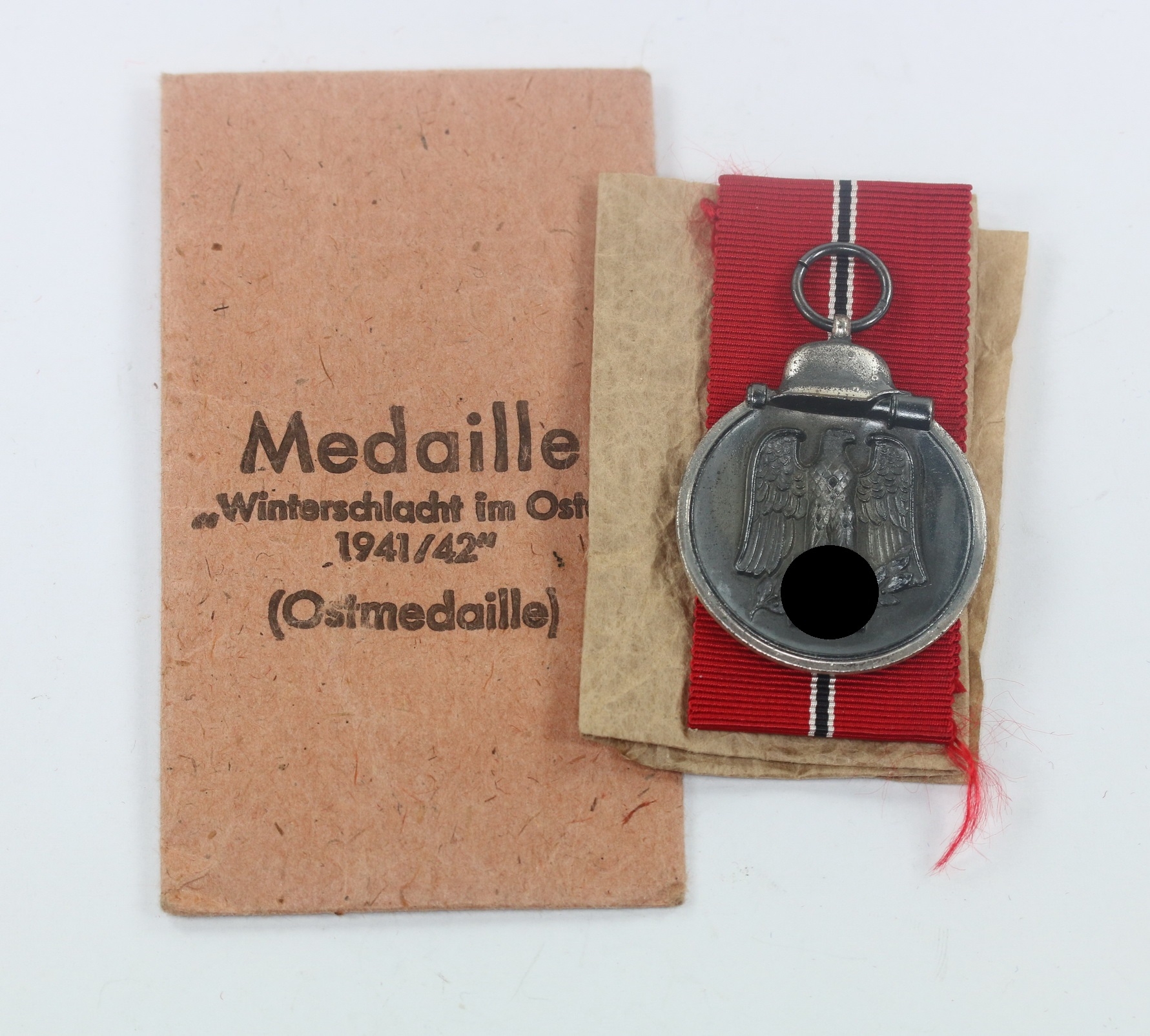 ostmedaille_hst Ostmedaille, Hst. 65, in Verleihungstüte Klein & Quenzer A.G. Oberstein – Bild 1