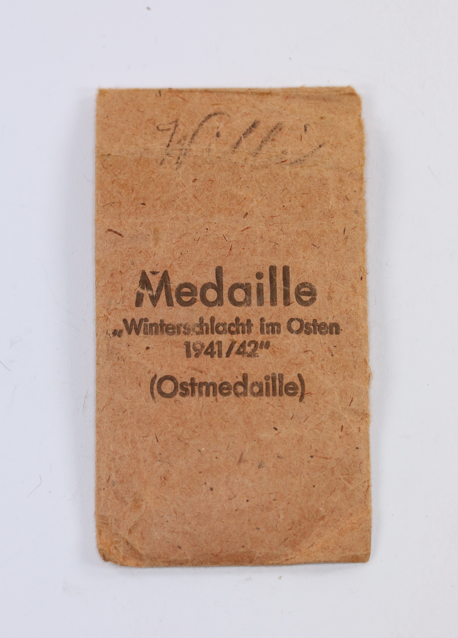 tuete_ostmedaille_klein_quenzer_a Envelope for the Eastern Front Medal. Maker Klein & Quenzer. – Bild 1