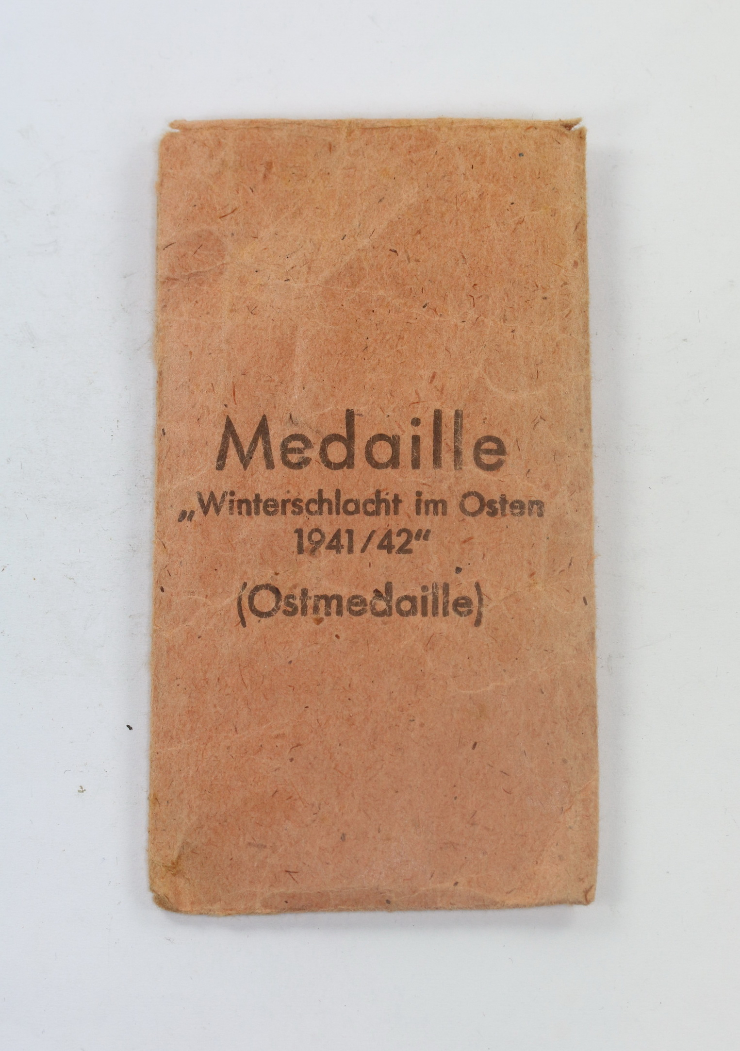 Verleihungstüte Ostmedaille, E. Fred. Wiedmann Frankfurt a. M. S10 (Hersteller 19) – Bild 1