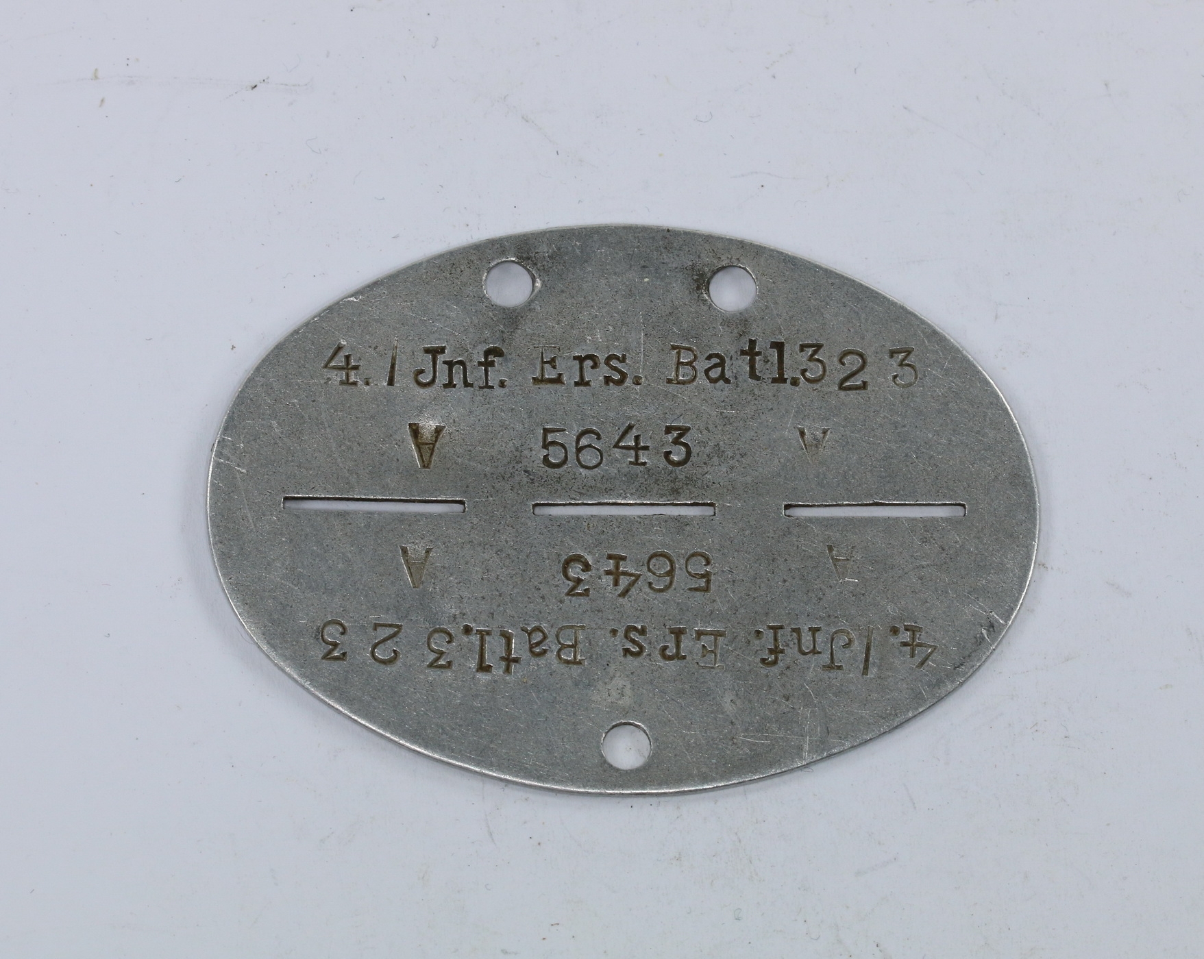 wehrmacht_erkennungsmarke_infanterie_ersatz_bataillon_323_1_ Identity Disc, Infanterie Ersatz Bataillon 323 – Bild 1