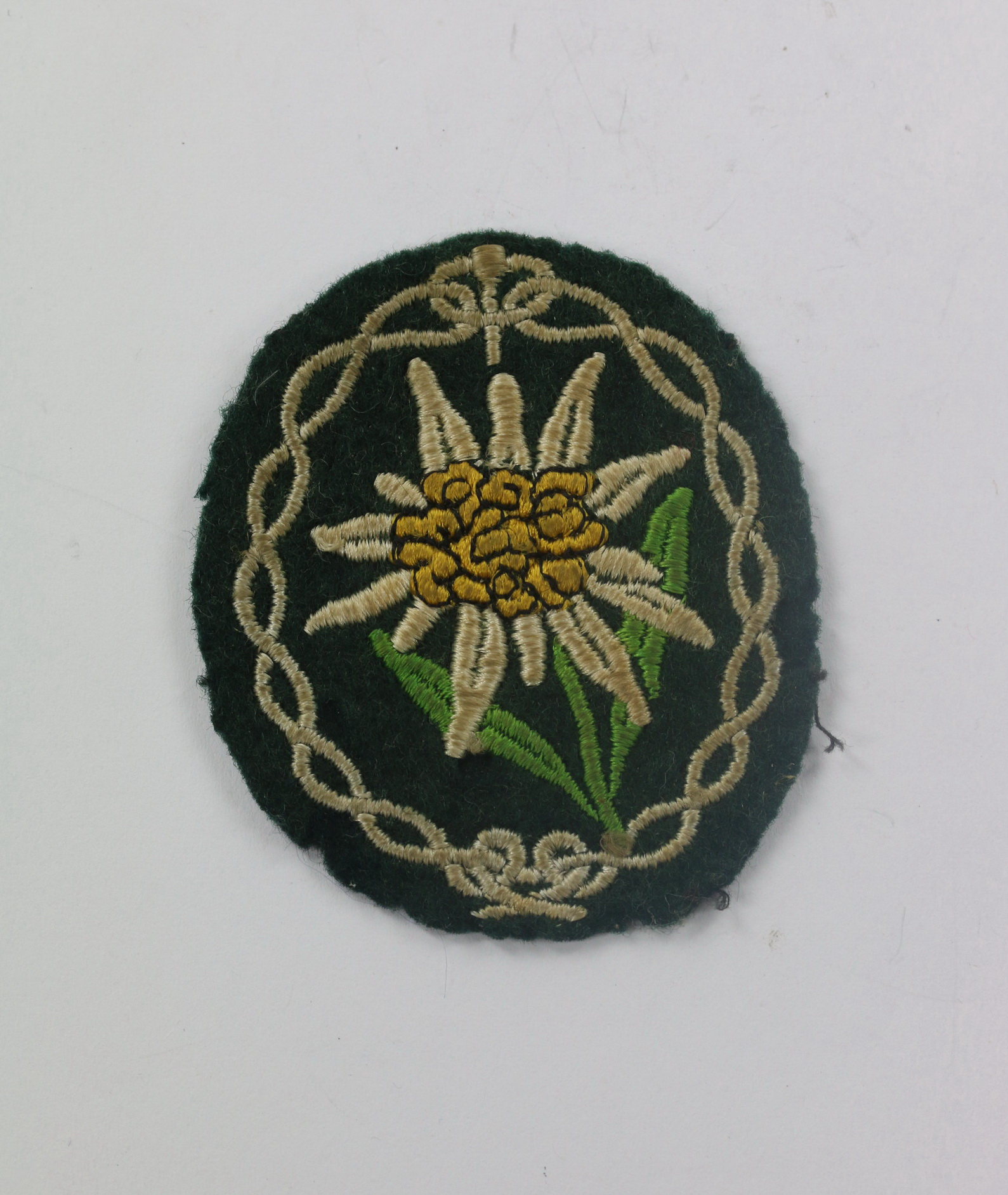  Wehrmacht Heer, Edelweiss Ärmelabzeichen für Gebirgsjäger Mannschaften – Bild 1