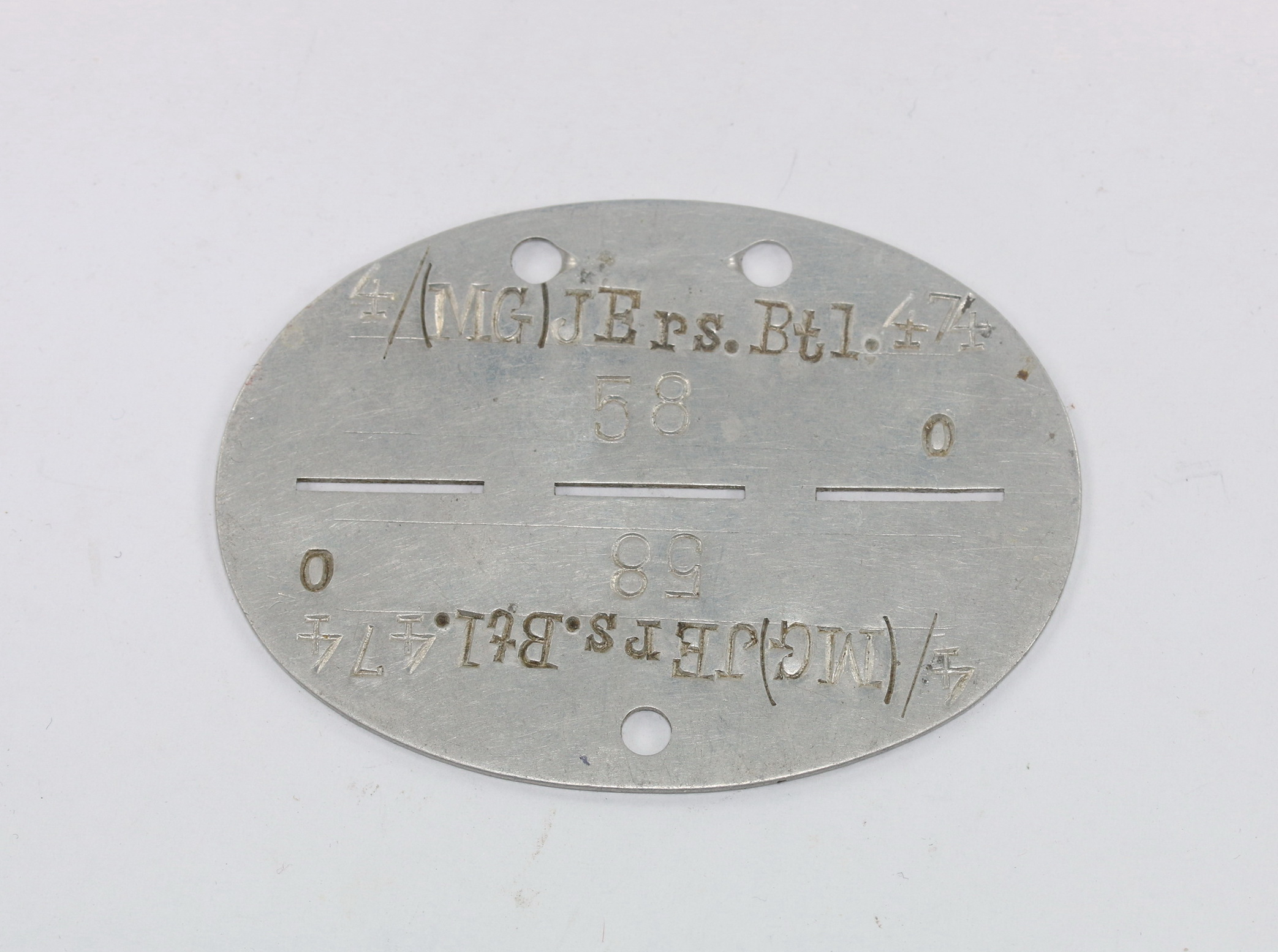 Wehrmacht Heer, Erkennungsmarke Maschienengewehr Infanterie Ersatz Bataillon 474 (M.G. JErs. Btl. 474) – Bild 1