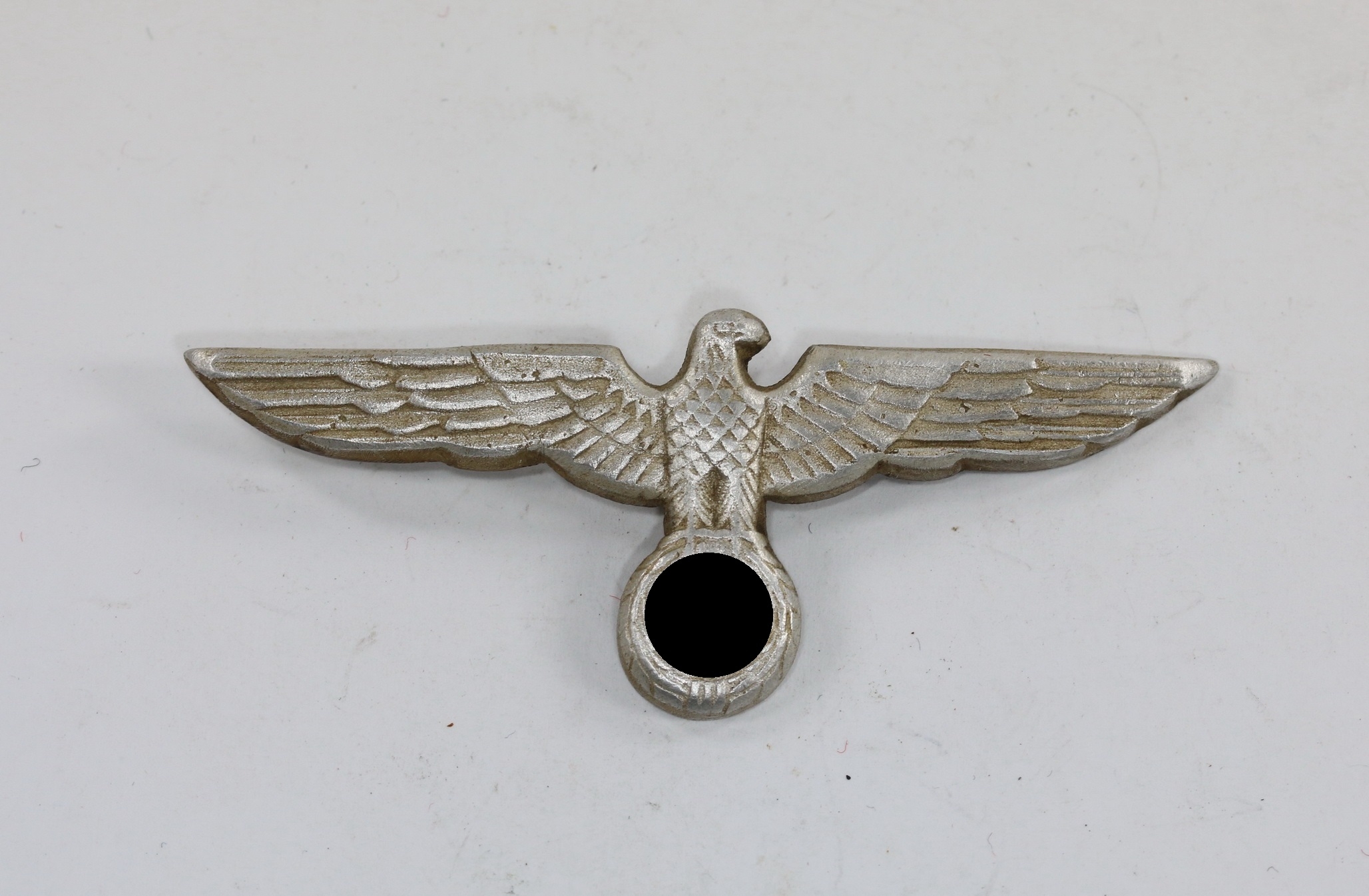 wehrmacht_heer_m_tzenadler_f_r_die_schirmm_tze_hst Eagle for the Army Peak Cap. Maker A. – Bild 1