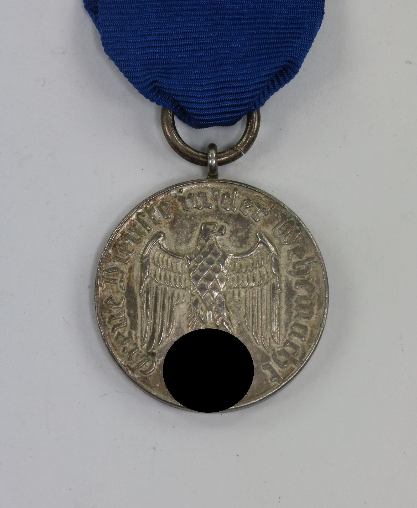 _wehrmachtsdienstauszeichnung_f_r_4_jahre_treue_dienste_in_der_wehrmacht_nicht_magnetisch_1__1 Armed Forces Loyal Service Medal for Four Years. – Bild 1