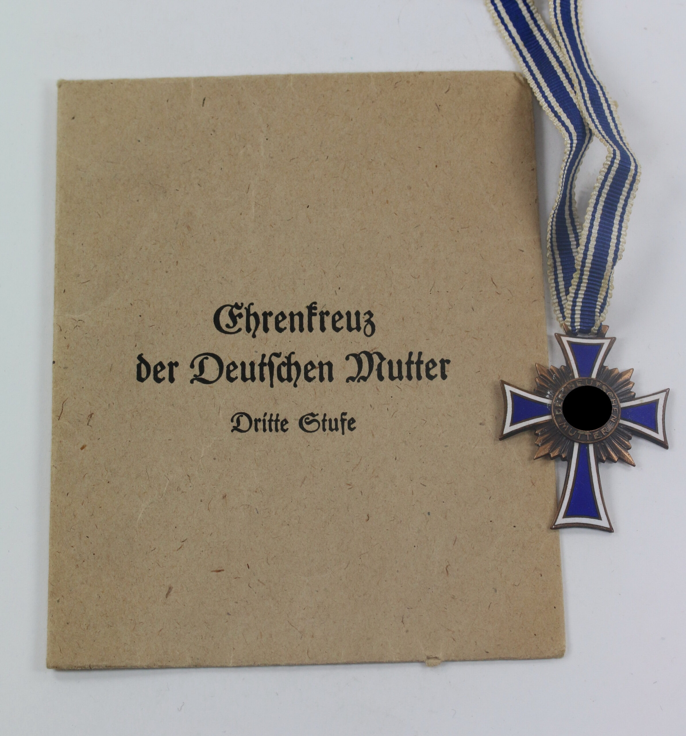 edelmetallwerke_aktiengesellschaft_wien_14_1__1 Mutterkreuz in Bronze, in Verleihungstüte Edelmetallwerke Aktiengesellschaft Wien 14 – Bild 1