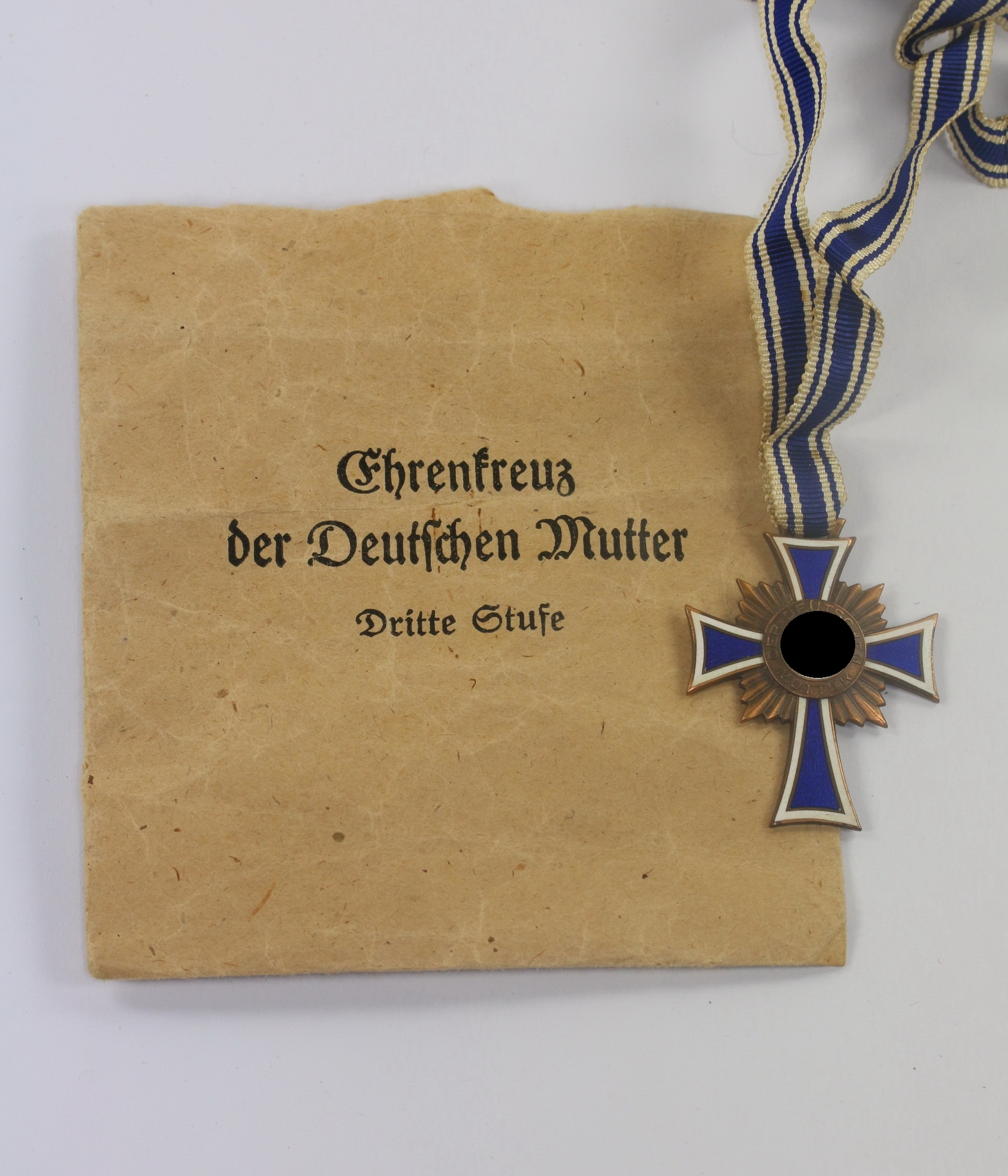 mutterkreuz_in_bronze_in_verleihungst_te_gebr Mutterkreuz in Bronze, in Verleihungstüte Gebr. Schmidt Oberstein Nahe – Bild 1