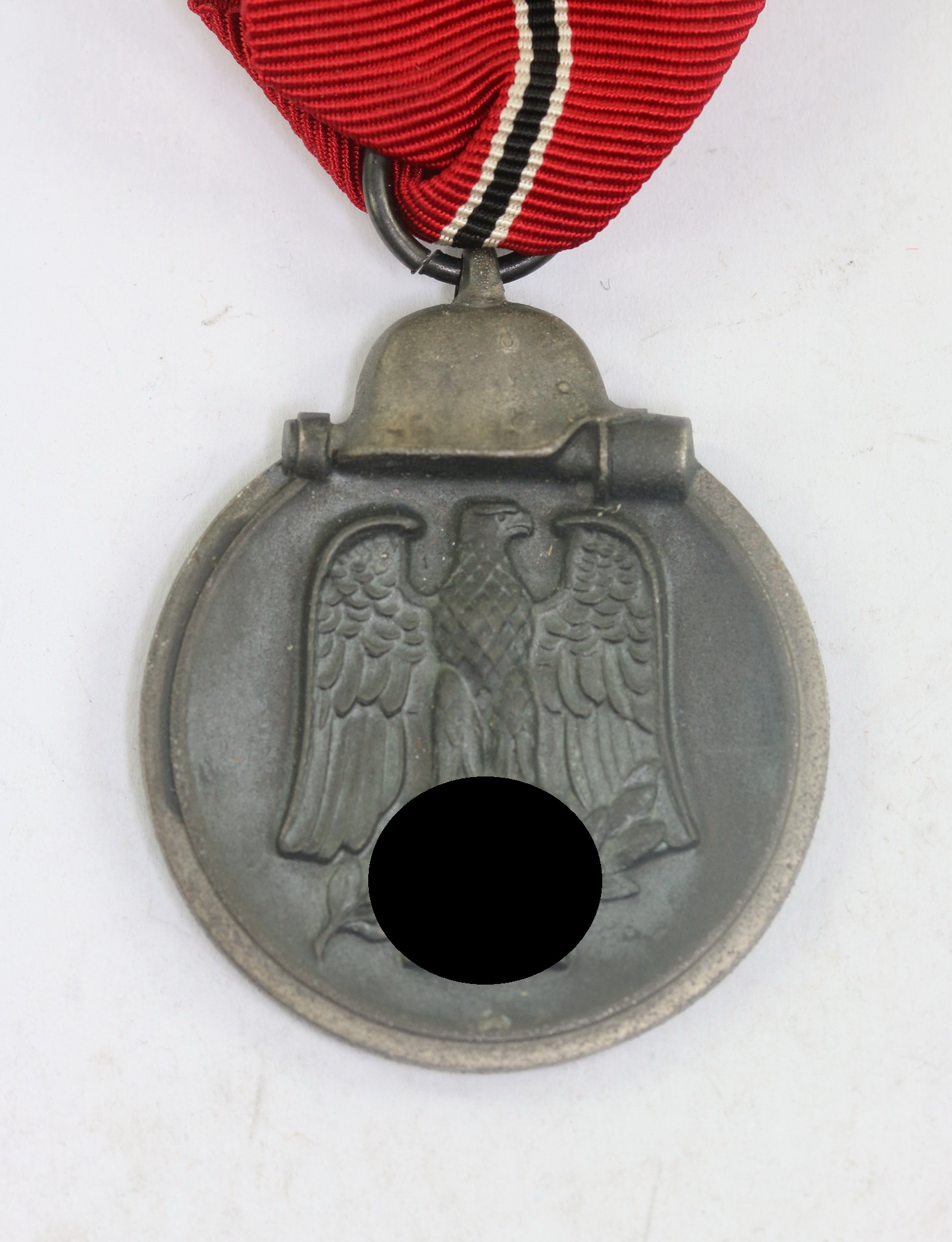 Eastern Front Medal. Maker 25. (Arbeitsgemeinschaft der Graveur-, Gold- und Silberschmiedeinnungen, Hanau am Main) – Bild 1