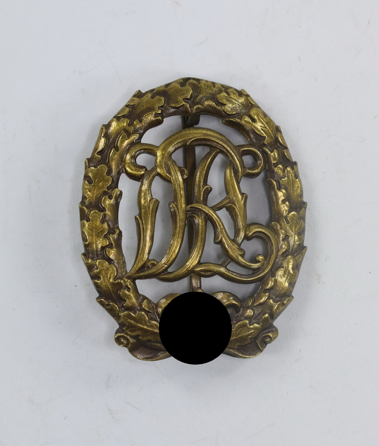 Reichssportabzeichen in Bronze, Hst. Ernst L. Müller Pforzheim – Bild 1