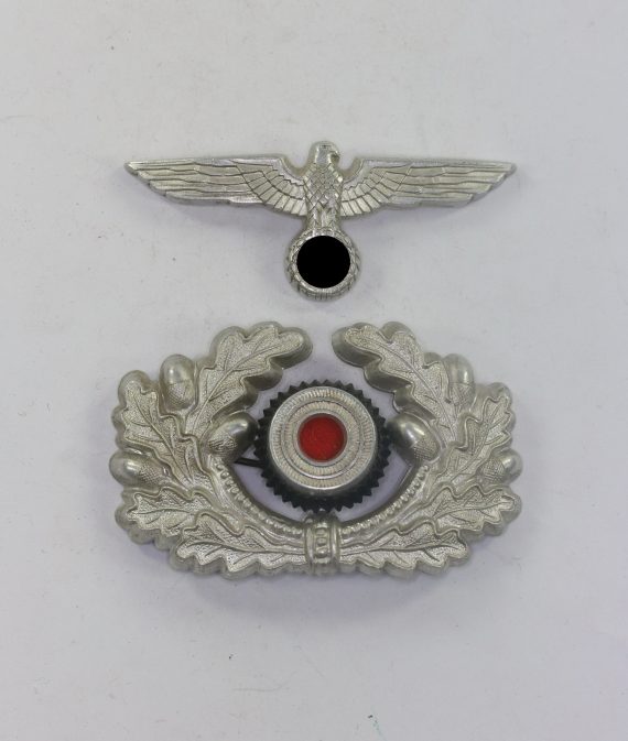 wehrmacht_heer_hoheitsadler_und_eichenlaubkranz_mit_kokarde_f_r_die_offiziersschirmm_tze_1__1_4nd